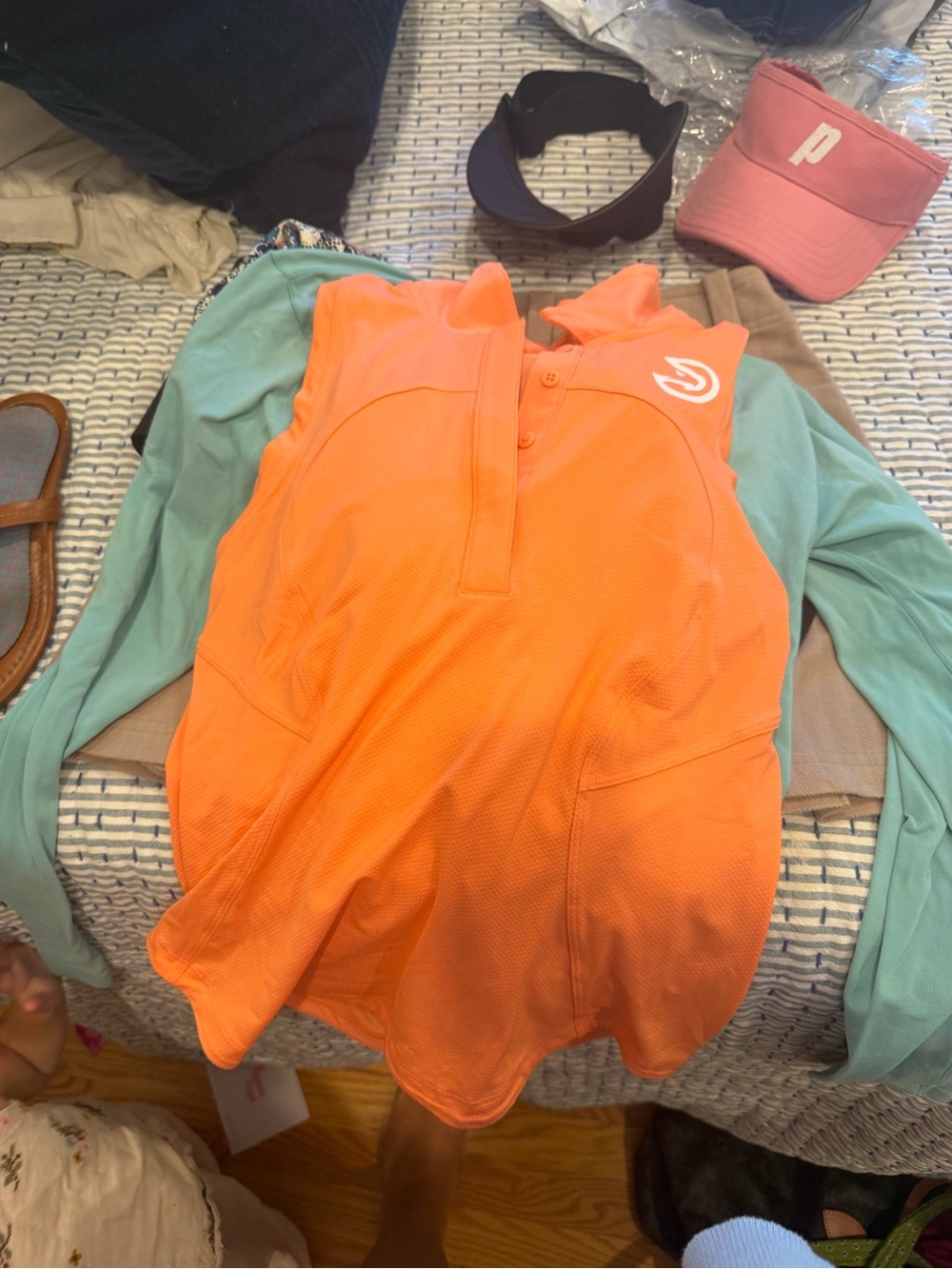 Lululemon gold or tennis polo Orange Sleeveless Golf Polo with White Logo